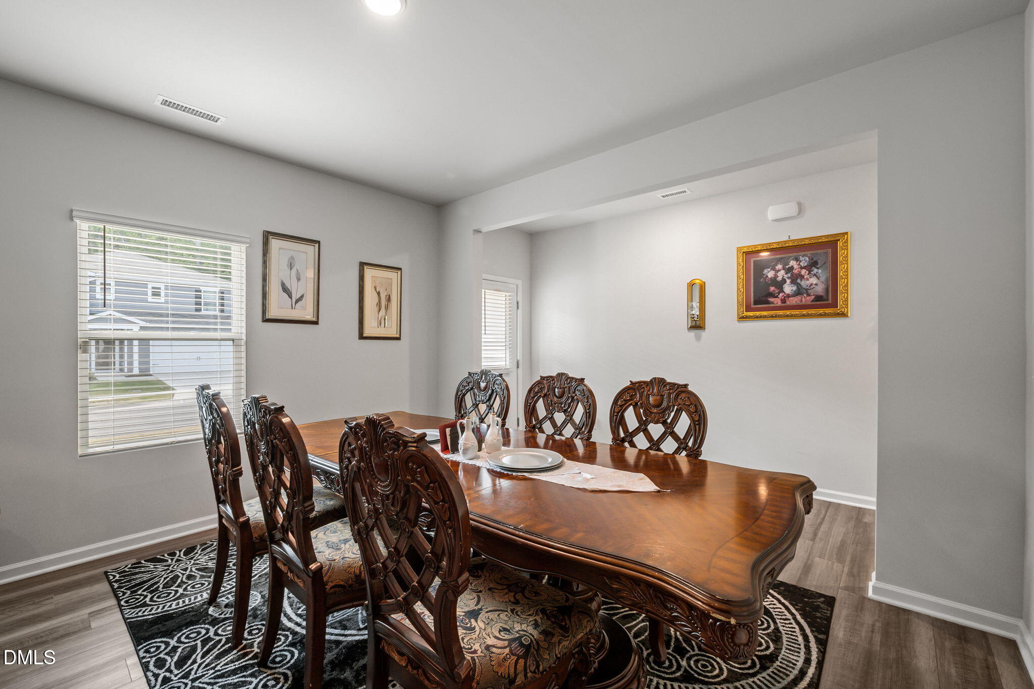 3000 Farndale Trace Durham, NC 27712 - Photo 14 of 36 a view of a dining room with furniture and wooden floor