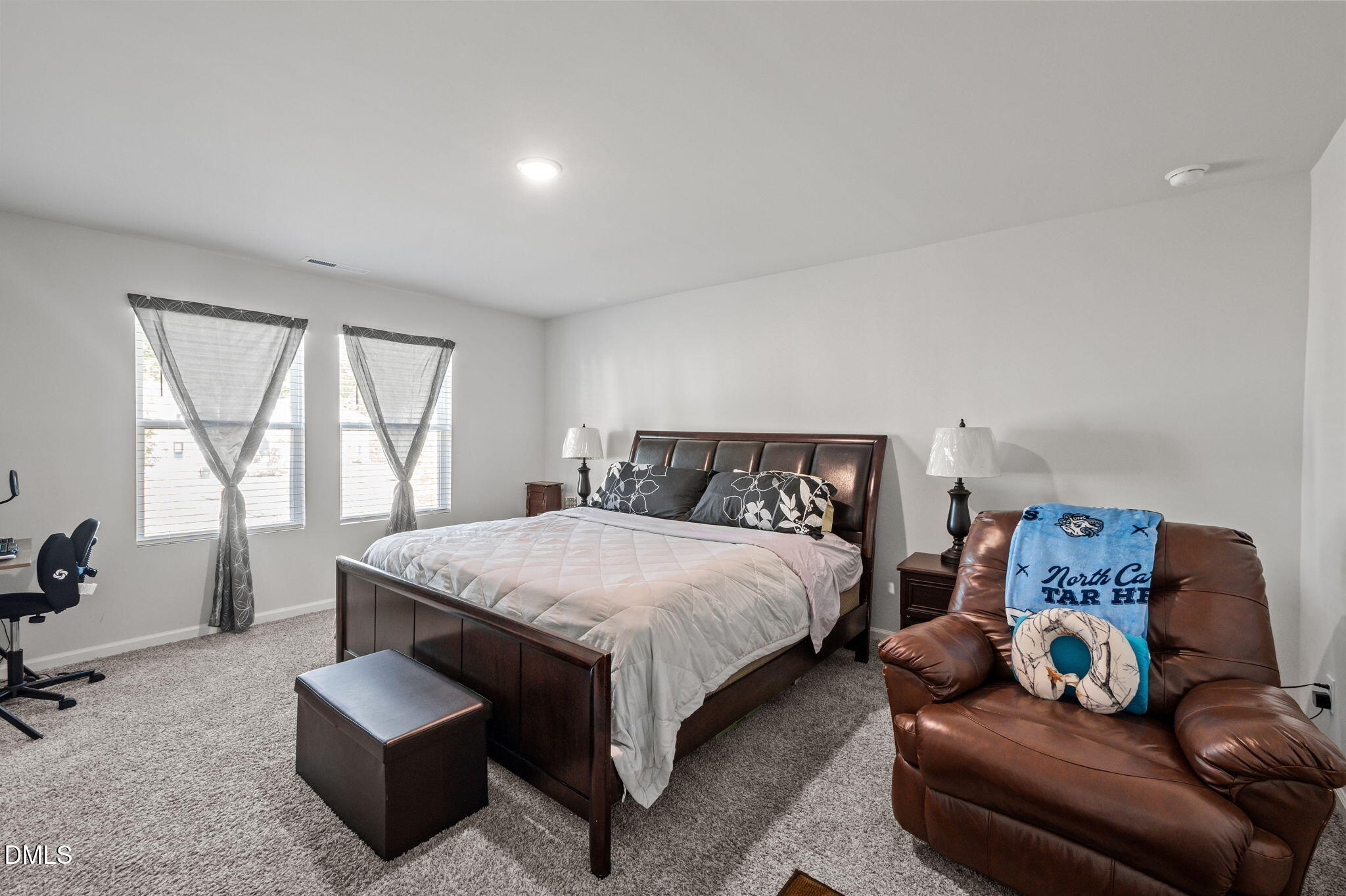 3000 Farndale Trace Durham, NC 27712 - Photo 16 of 36 a bedroom with bed and a couch