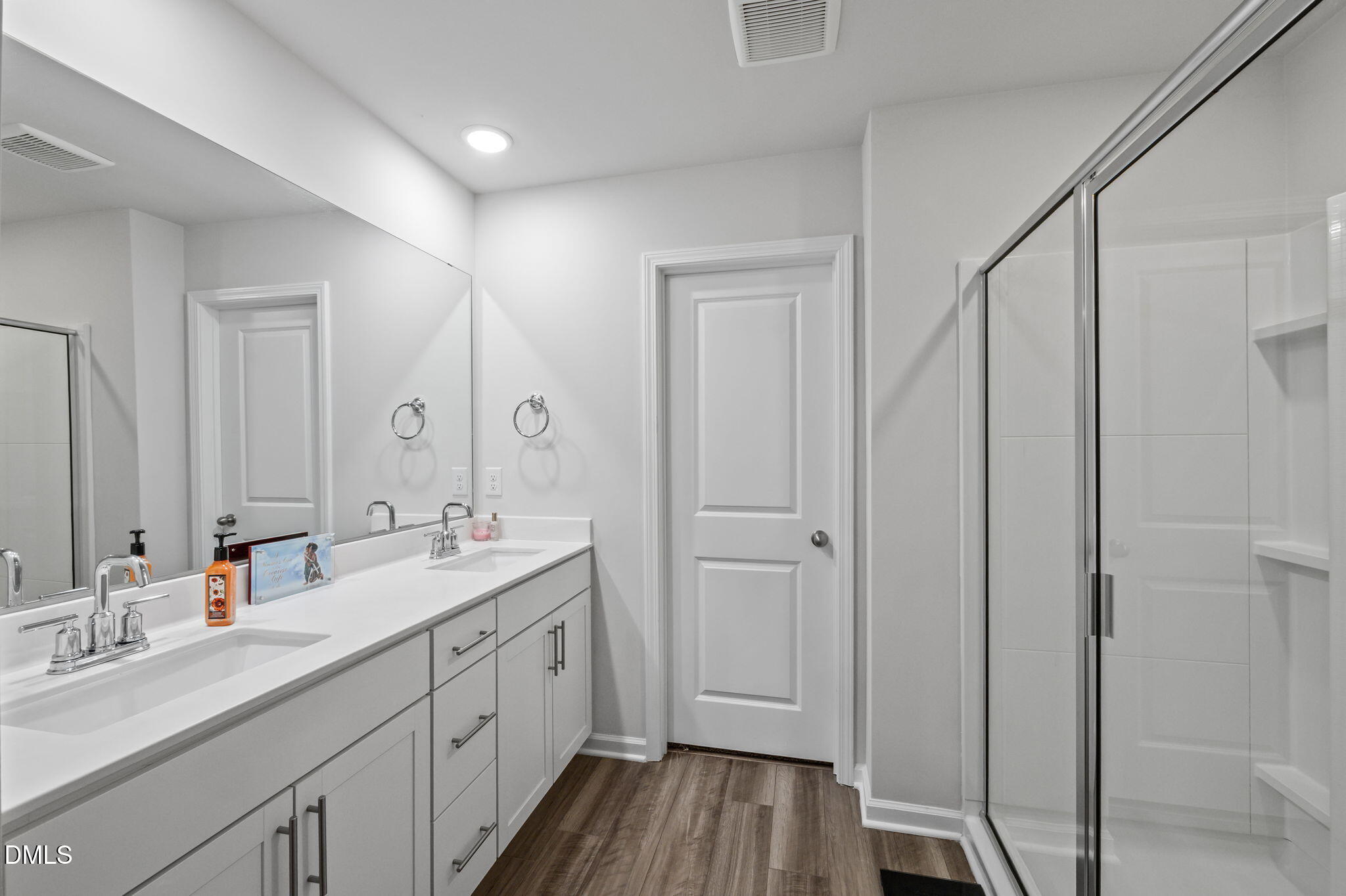 3000 Farndale Trace Durham, NC 27712 - Photo 18 of 36 a spacious bathroom with a double vanity sink double and mirror