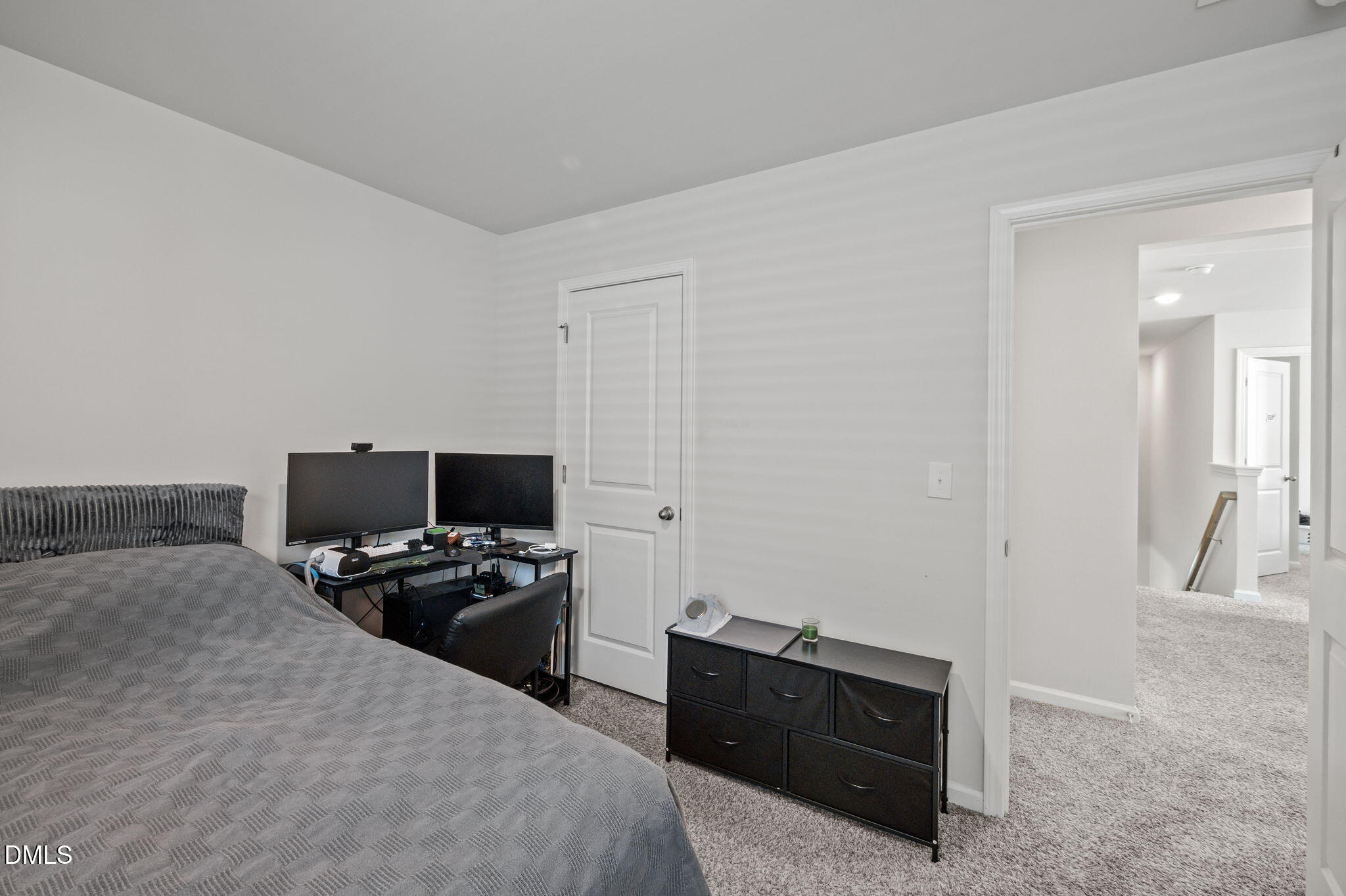 3000 Farndale Trace Durham, NC 27712 - Photo 22 of 36 a bedroom with a bed and wooden floor