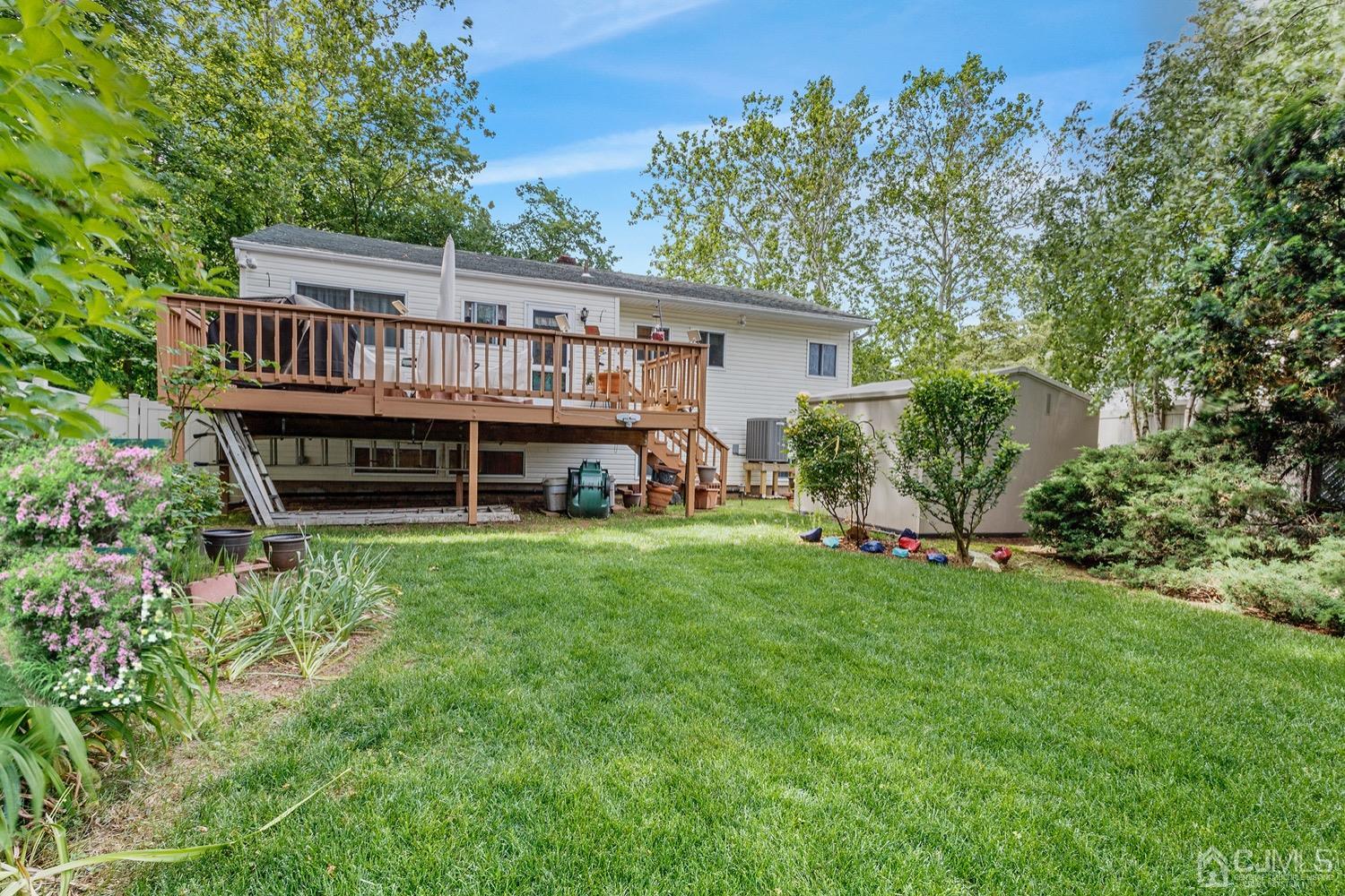 136 Lee Drive Middlesex, NJ 08846 - Photo 27 of 35 a view of a house with backyard and porch