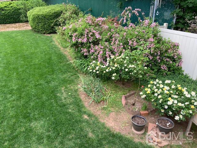 136 Lee Drive Middlesex, NJ 08846 - Photo 31 of 35 a view of a tree with a garden