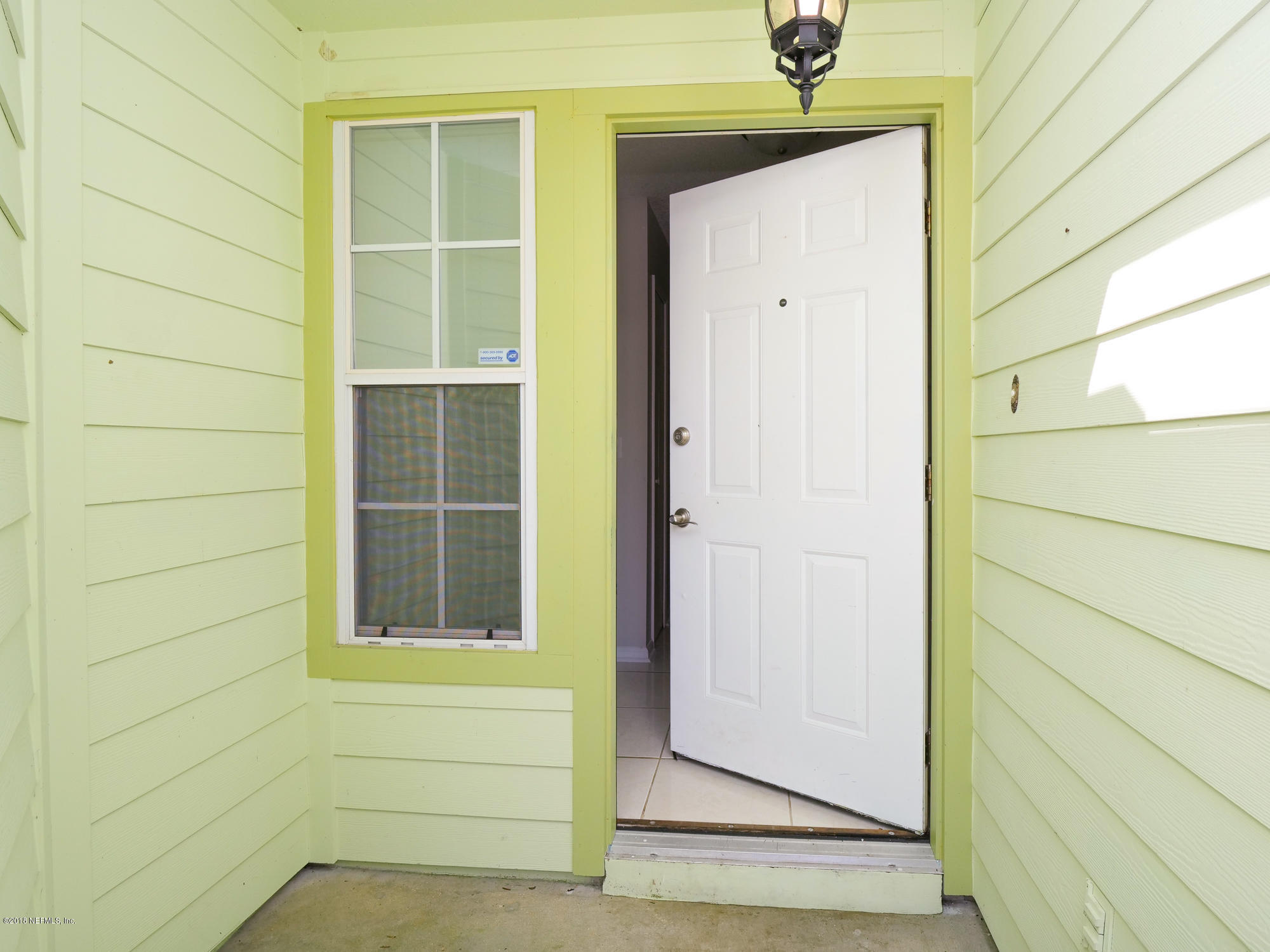 2448 Spring Vale Road Jacksonville, FL 32246 - Photo 3 of 24 a view of front door