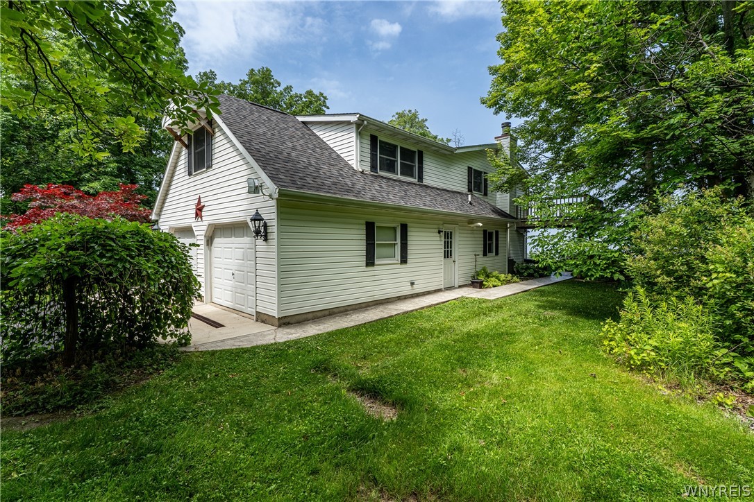 629 Lake Road Porter, NY 14174 - Photo 5 of 49 Side walk around side to Patio