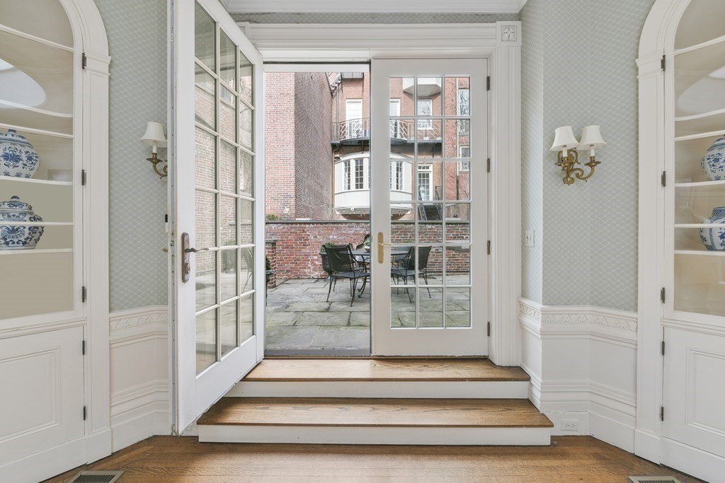 31 Chestnut Street Boston, MA 02108 - Photo 13 of 29 a view of entryway with wooden floor and glass door