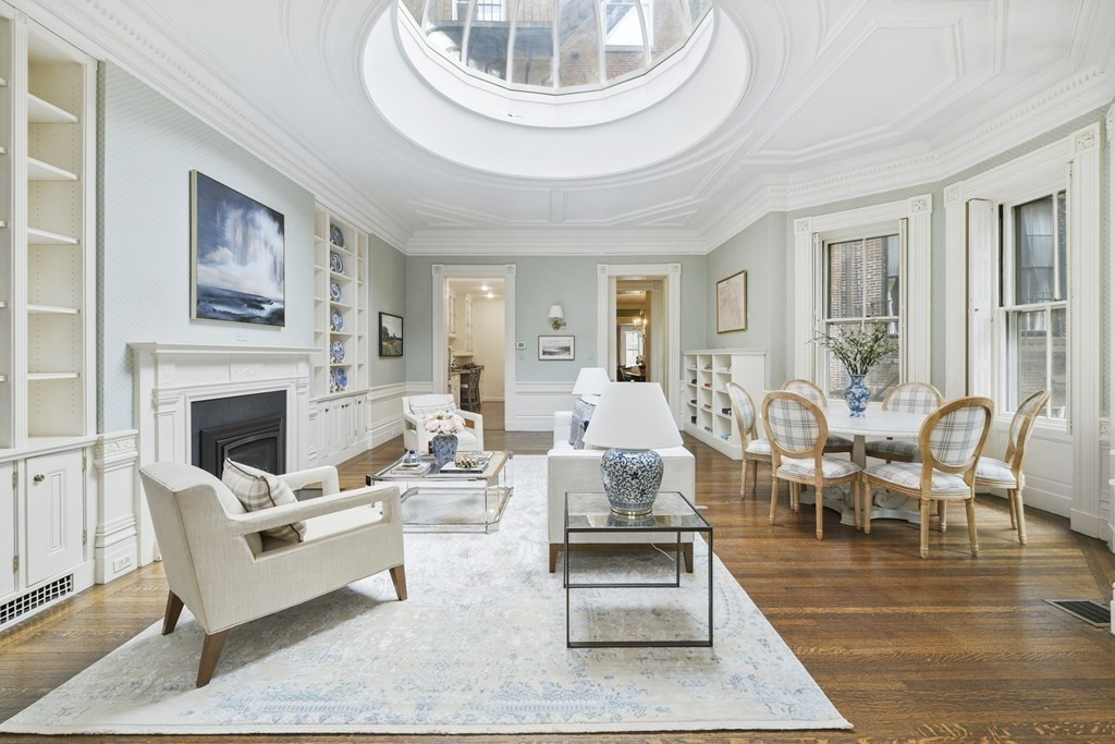 31 Chestnut Street Boston, MA 02108 - Photo 15 of 29 a living room with furniture a fireplace and a table