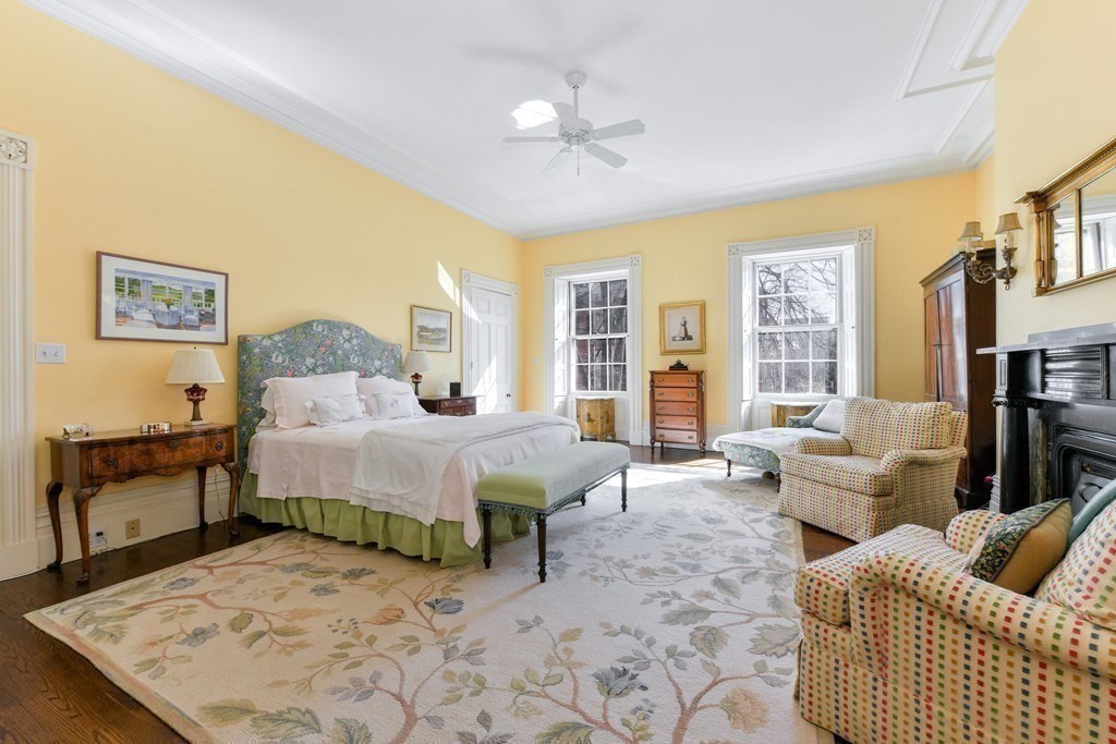 31 Chestnut Street Boston, MA 02108 - Photo 19 of 29 a spacious bedroom with a bed a couch and a chandelier