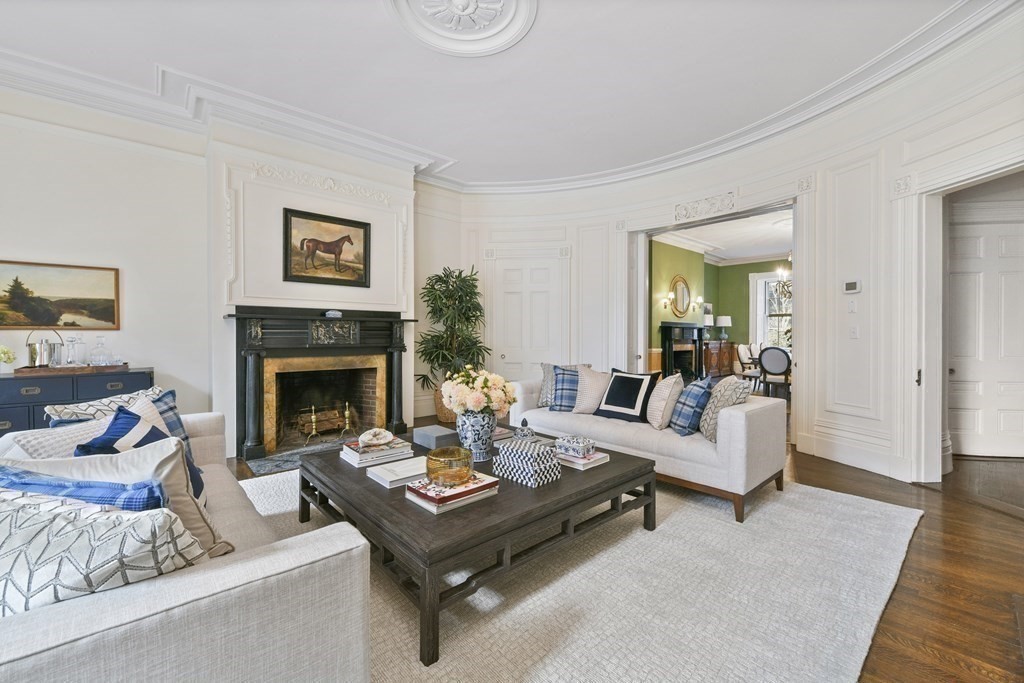 31 Chestnut Street Boston, MA 02108 - Photo 3 of 29 a living room with furniture and a fireplace