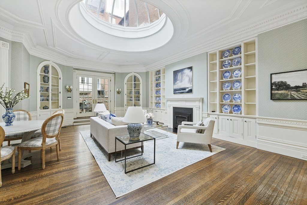 31 Chestnut Street Boston, MA 02108 - Photo 8 of 29 a living room with furniture a fireplace and a wooden floor