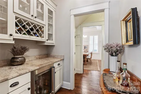 a kitchen with a table and chairs in it