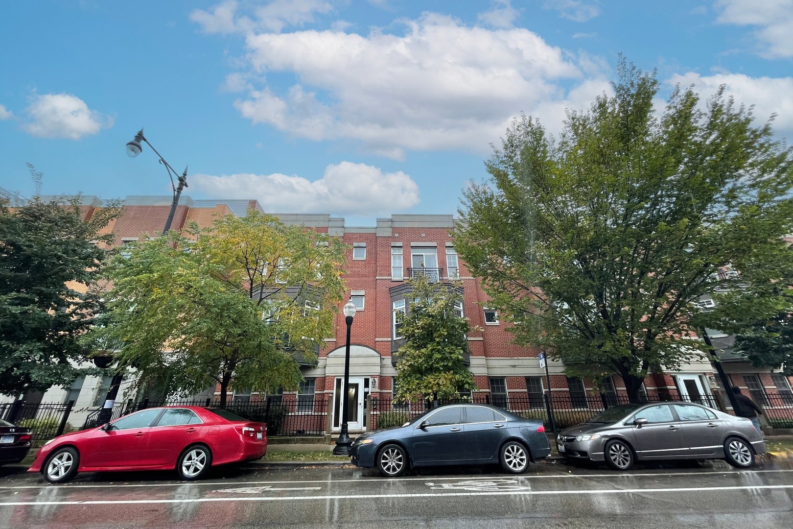 1414 South Halsted Street, Unit 3B Chicago, IL 60607 - Photo 1 of 14 a car parked in front of a house