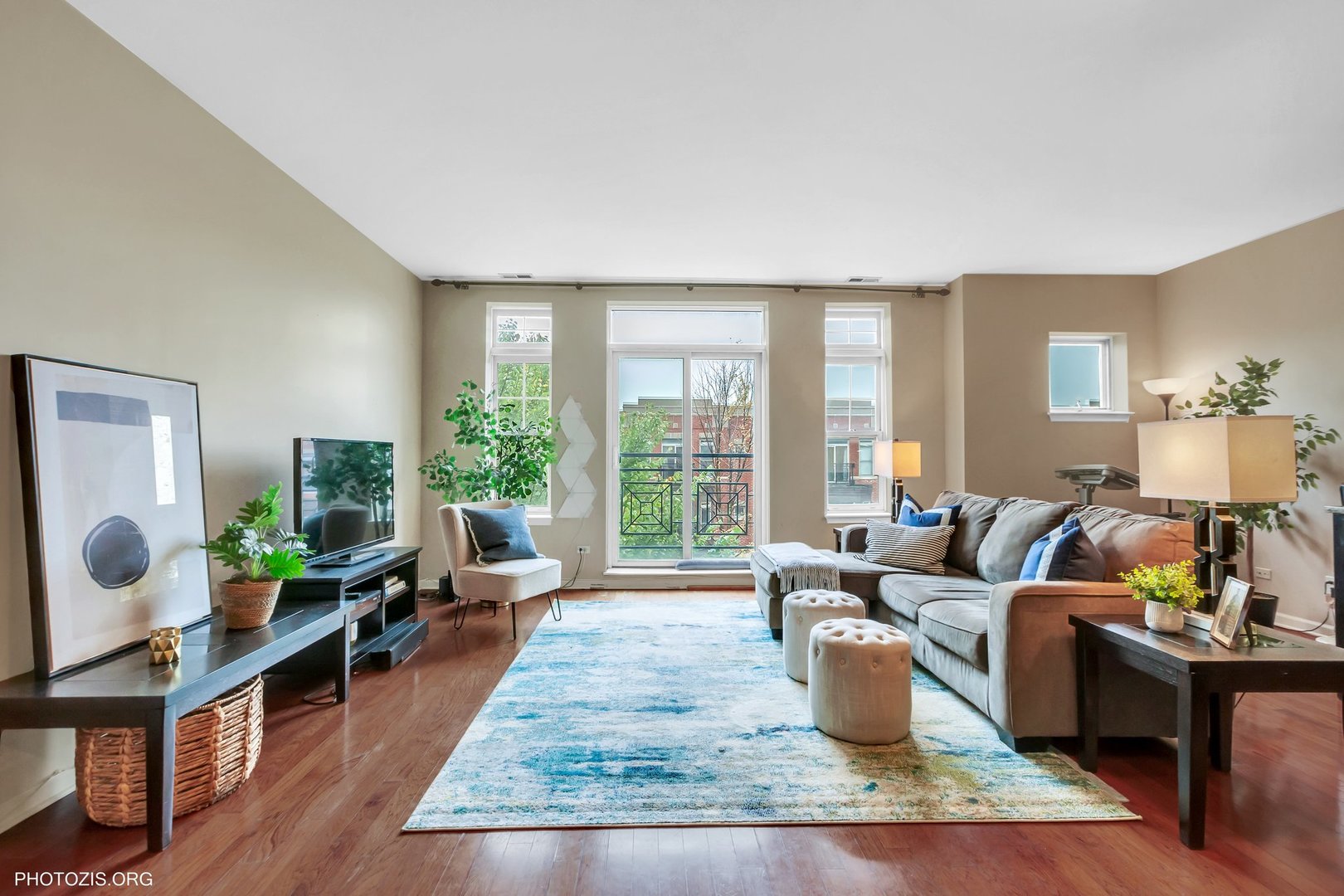 1414 South Halsted Street, Unit 3B Chicago, IL 60607 - Photo 2 of 14 a living room with furniture and a large window