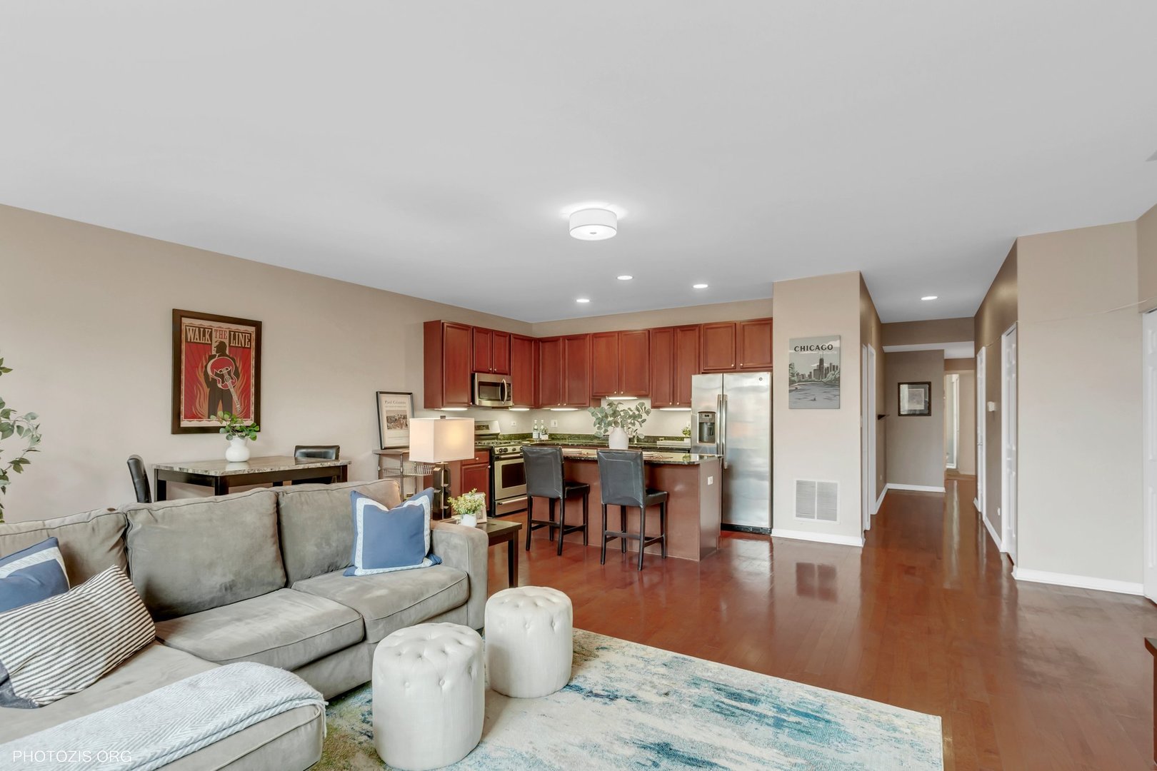1414 South Halsted Street, Unit 3B Chicago, IL 60607 - Photo 5 of 14 a living room with lots of furniture and kitchen view