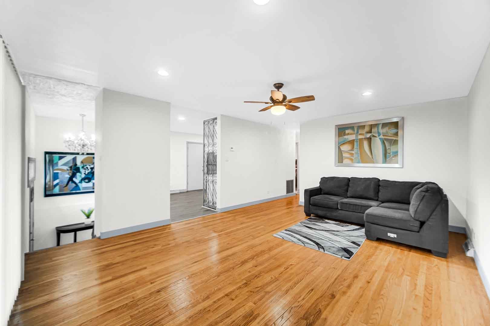 16607 Robey Street Markham, IL 60428 - Photo 12 of 24 a living room with furniture and a wooden floor