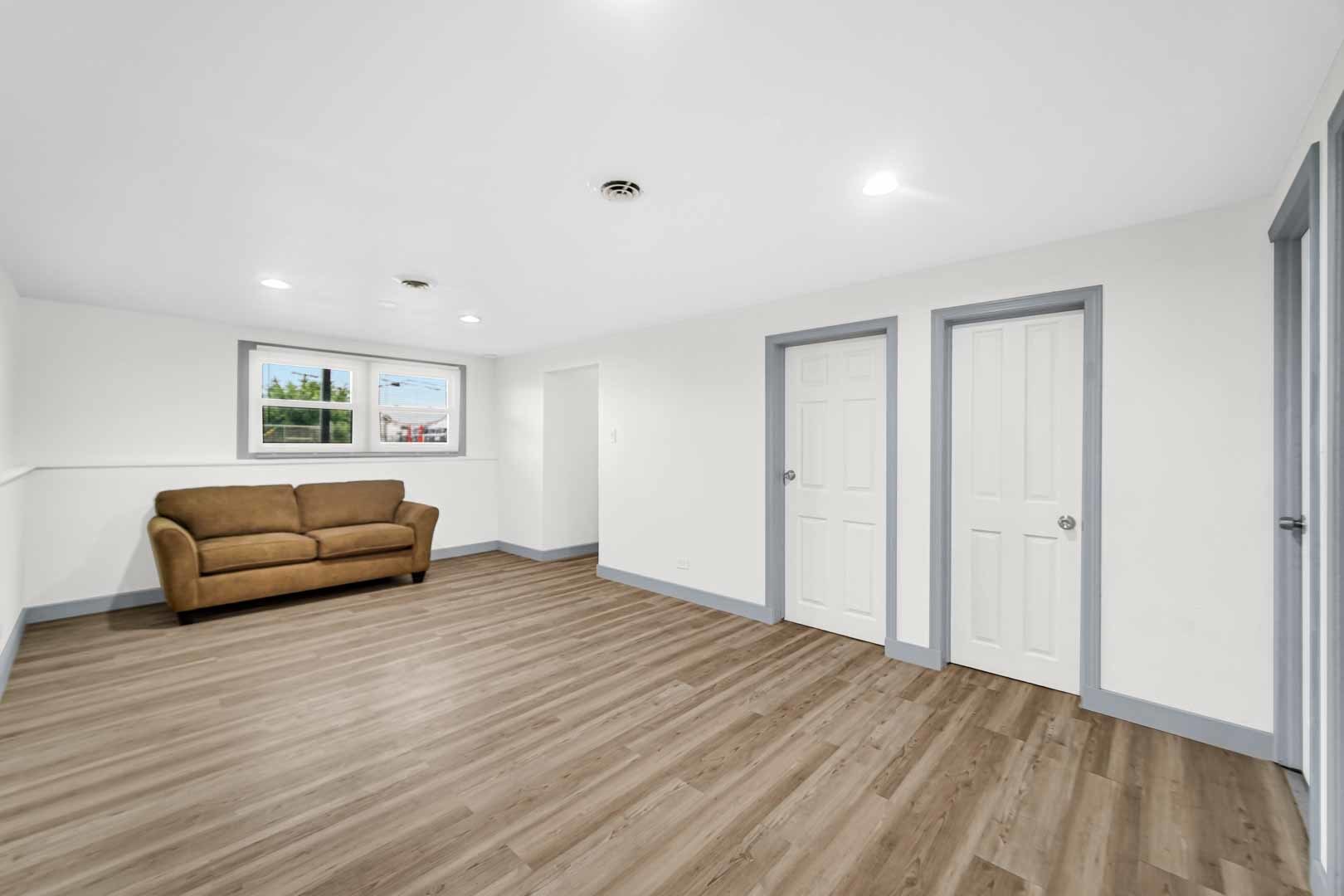 16607 Robey Street Markham, IL 60428 - Photo 15 of 24 a living room with furniture and a wooden floor