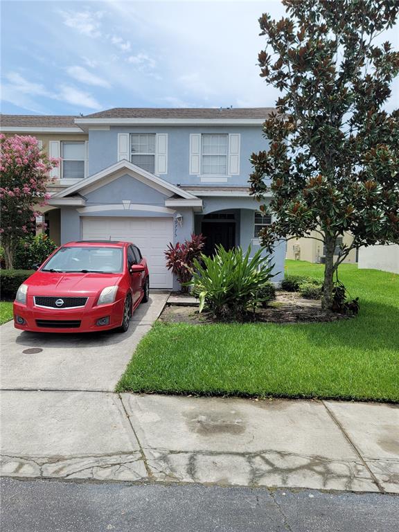 a car parked in front of a house
