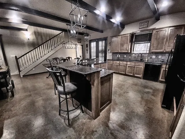 a kitchen with granite countertop lots of counter top space