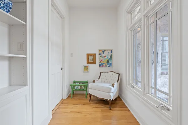 a living room with furniture and a gate