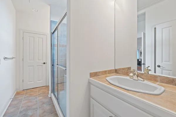 a bathroom with a sink and a mirror