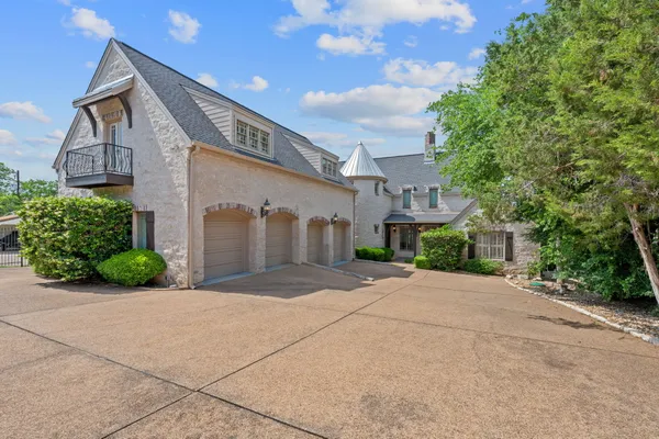a view of a house with a street