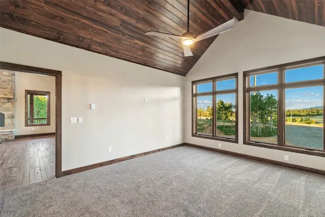 a view of a room with large windows