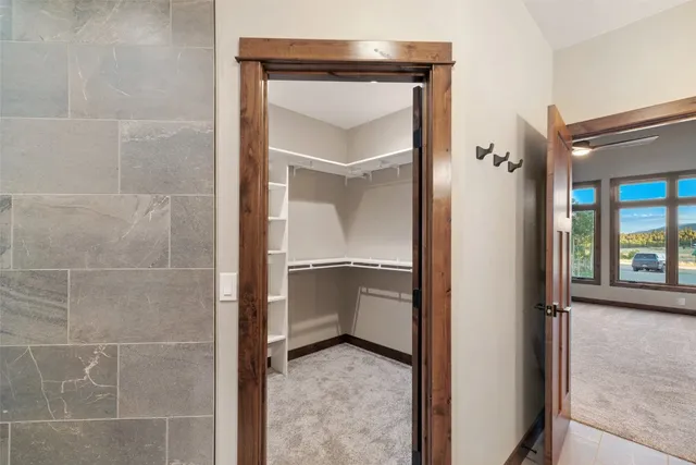 a bathroom with a vanity and mirror