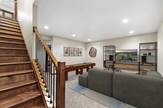 a bedroom with a large bed and a large window