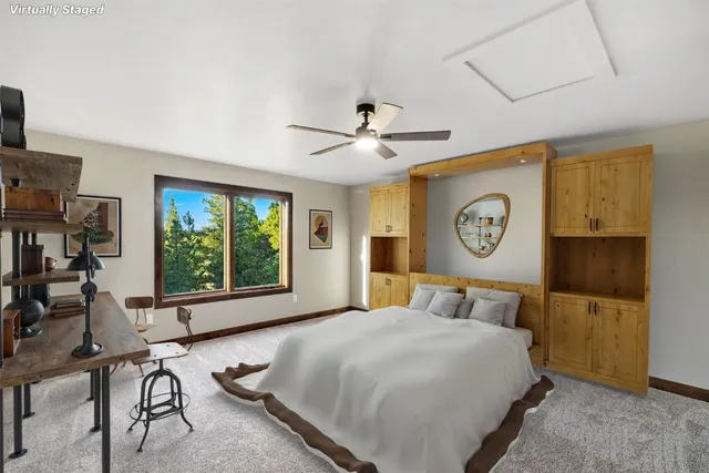 a bathroom with a granite countertop sink a mirror and a