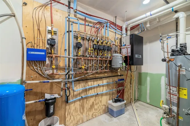 a view of a room with window and chandelier fan