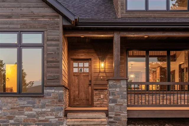 a view of a balcony with wooden floor