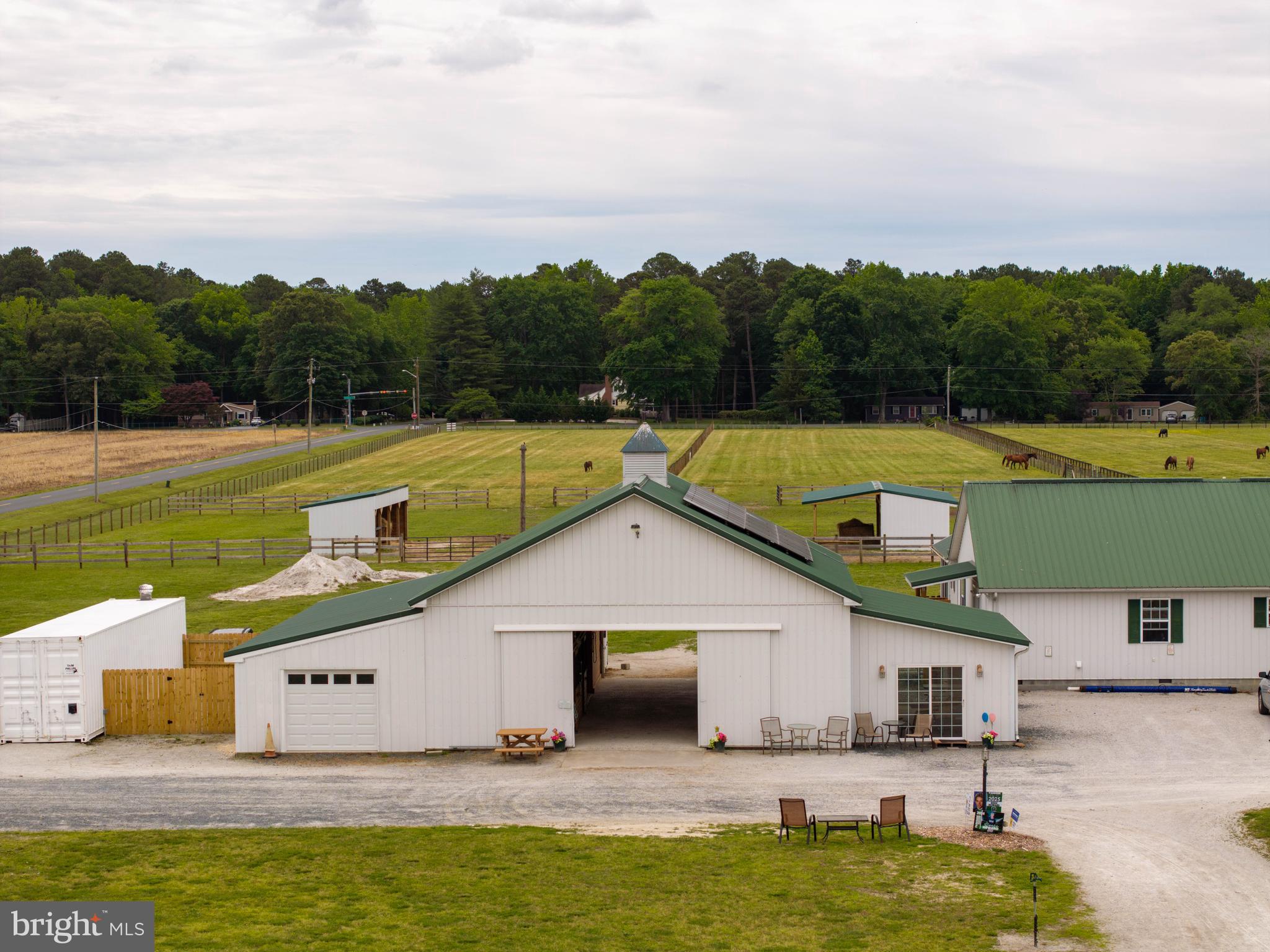 31191 Johnson Road Salisbury, MD 21804 - Photo 2 of 97 a view of a house with swimming pool and a yard