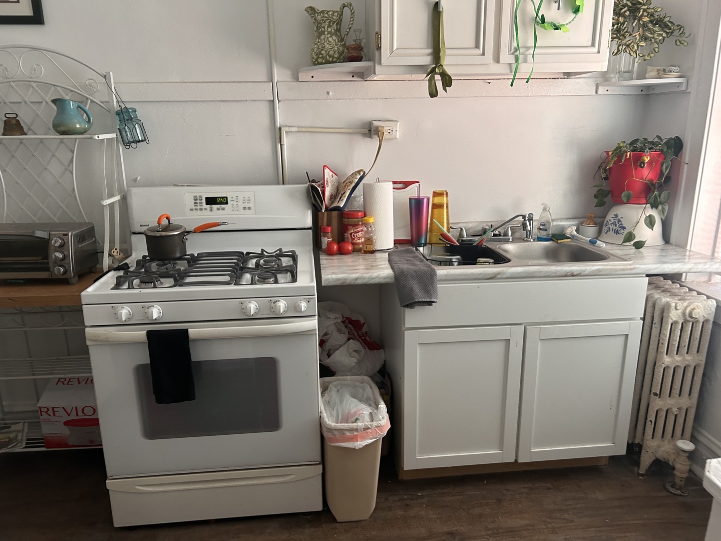 1301 Ridgeland Avenue, Unit A01 Berwyn, IL 60402 - Photo 6 of 8 a white stove top oven sitting inside of a kitchen