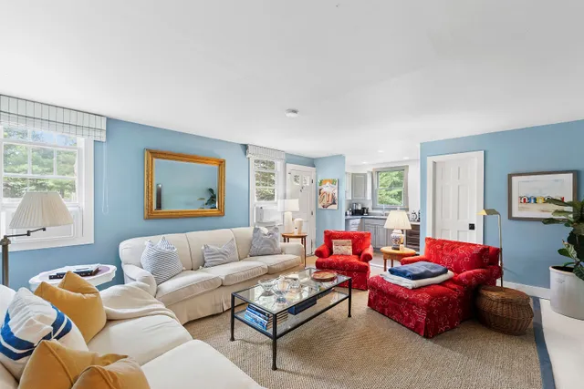 a living room with furniture or couch and a window