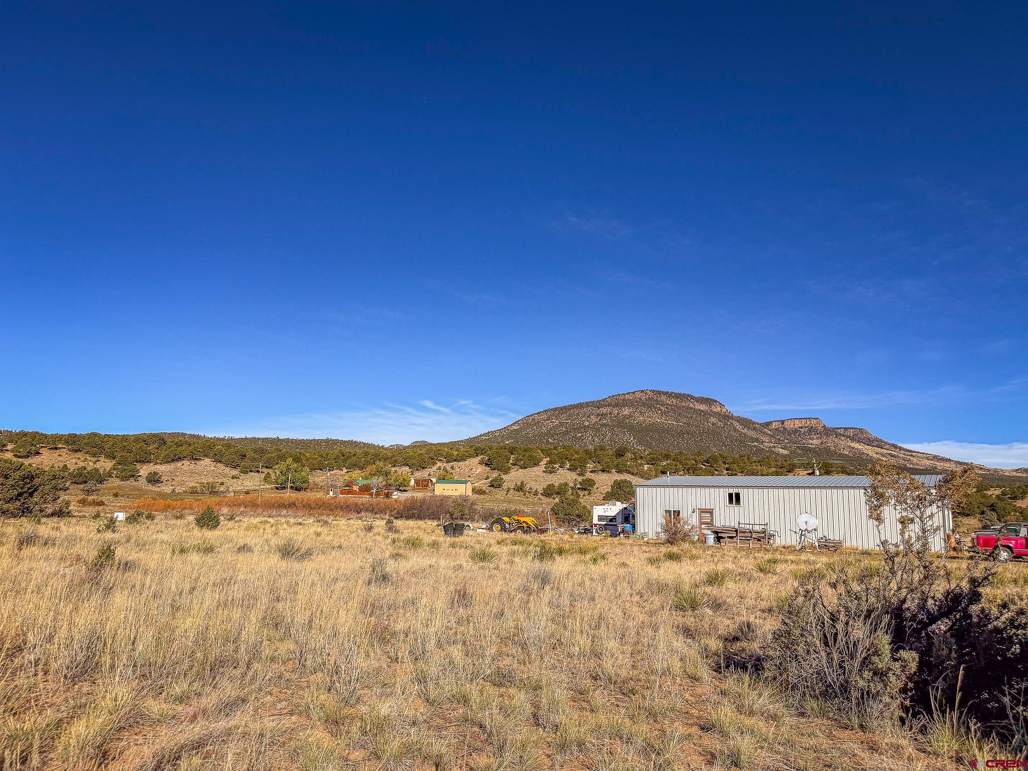 331 Red Feather Road South Fork, CO 81154 - Photo 2 of 6 a view of mountain with outdoor space