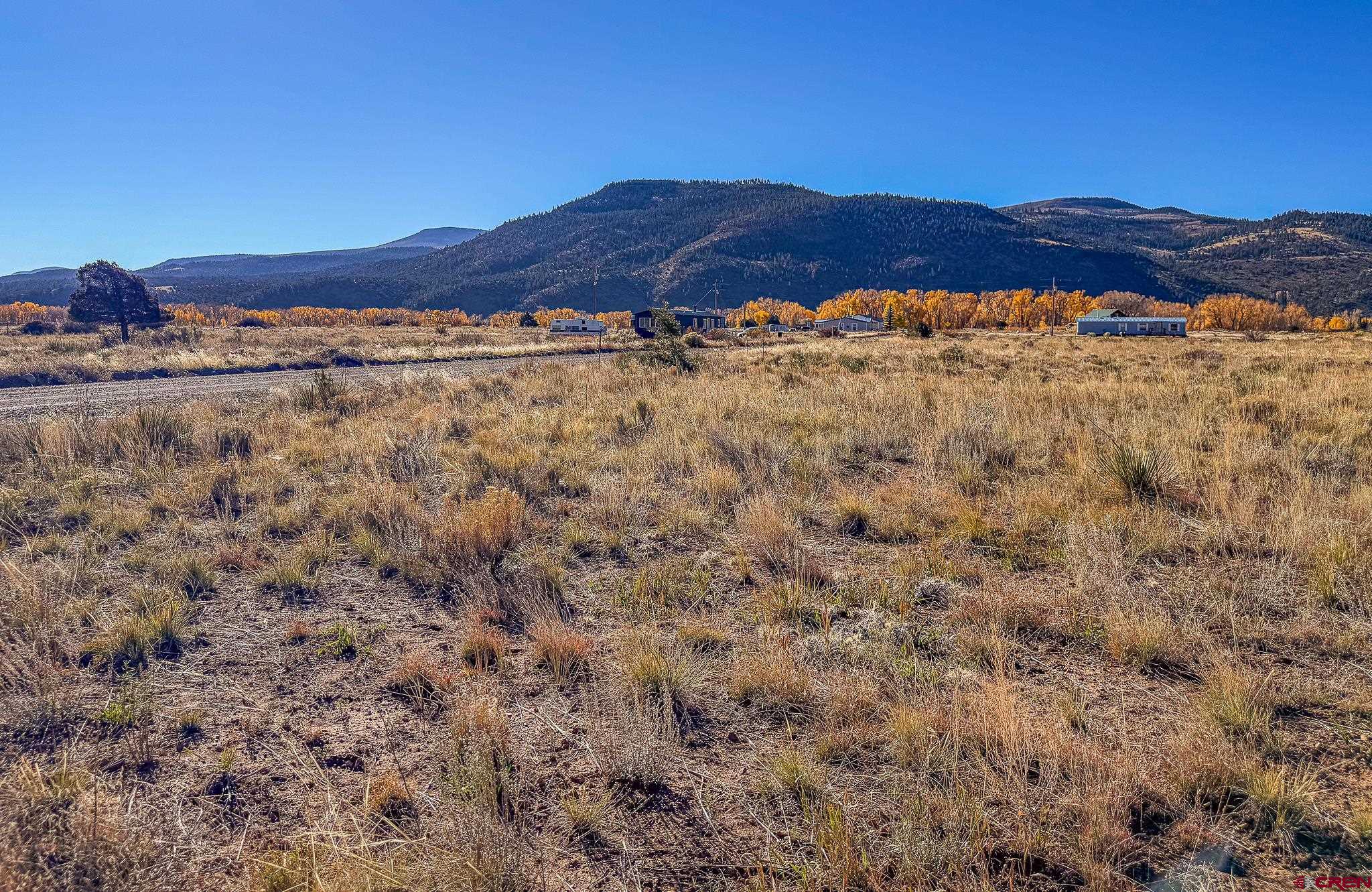 331 Red Feather Road South Fork, CO 81154 - Photo 5 of 6 a view of mountain with sunset in background