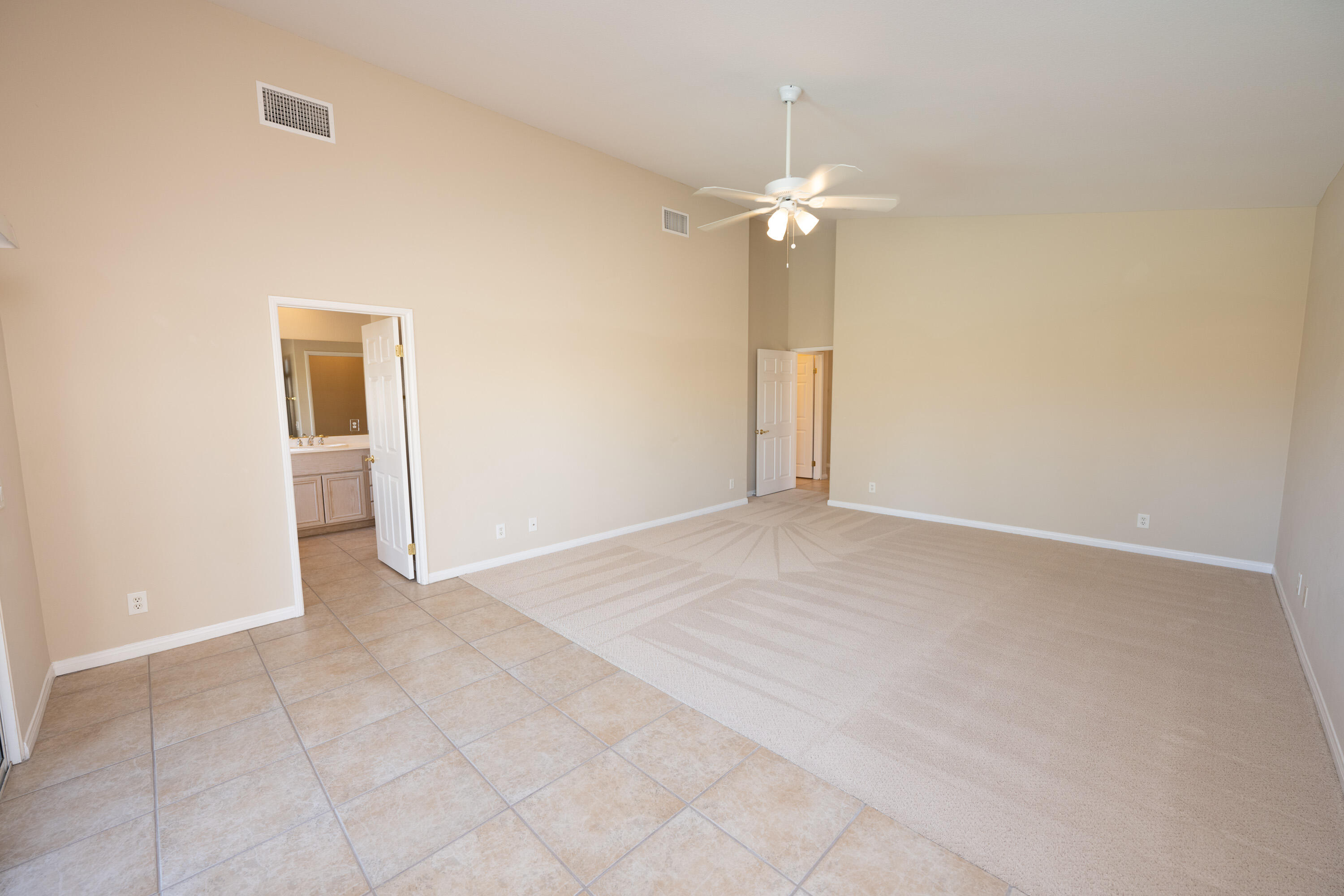 80162 Pebble Beach Drive Indio, CA 92201 - Photo 20 of 48 a view of an empty room with a fan