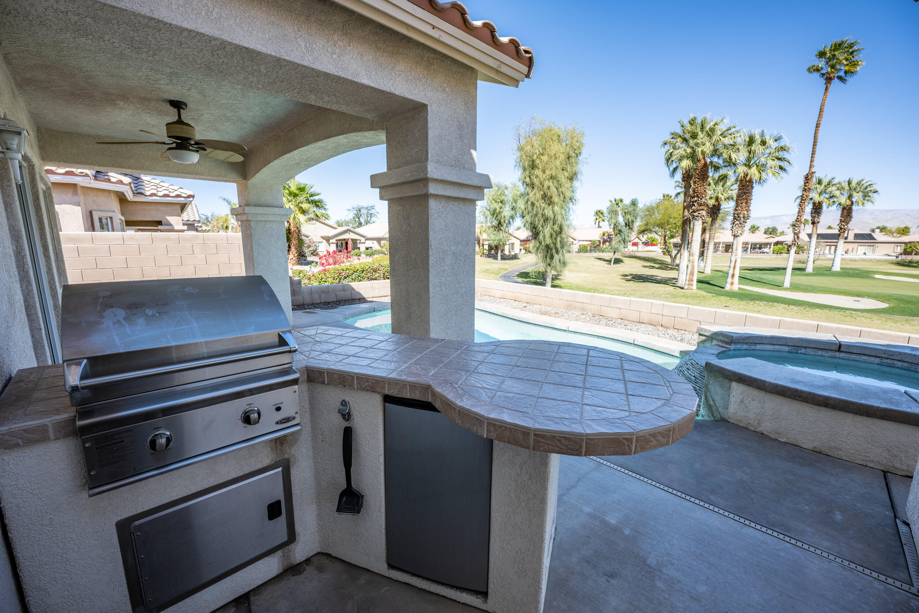 80162 Pebble Beach Drive Indio, CA 92201 - Photo 22 of 48 a kitchen view living space with a table and chairs
