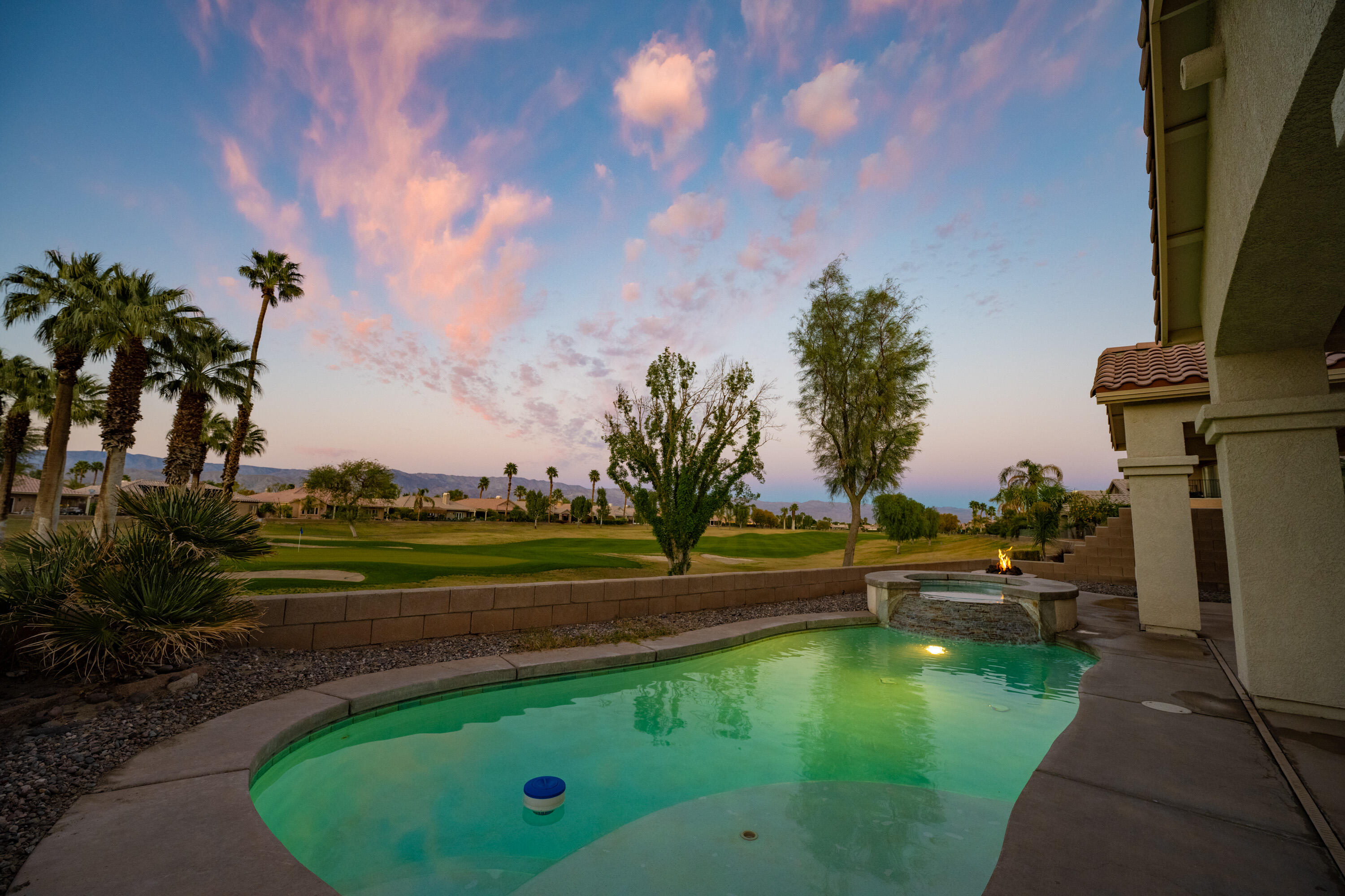 80162 Pebble Beach Drive Indio, CA 92201 - Photo 33 of 48 a view of a golf course with a lake