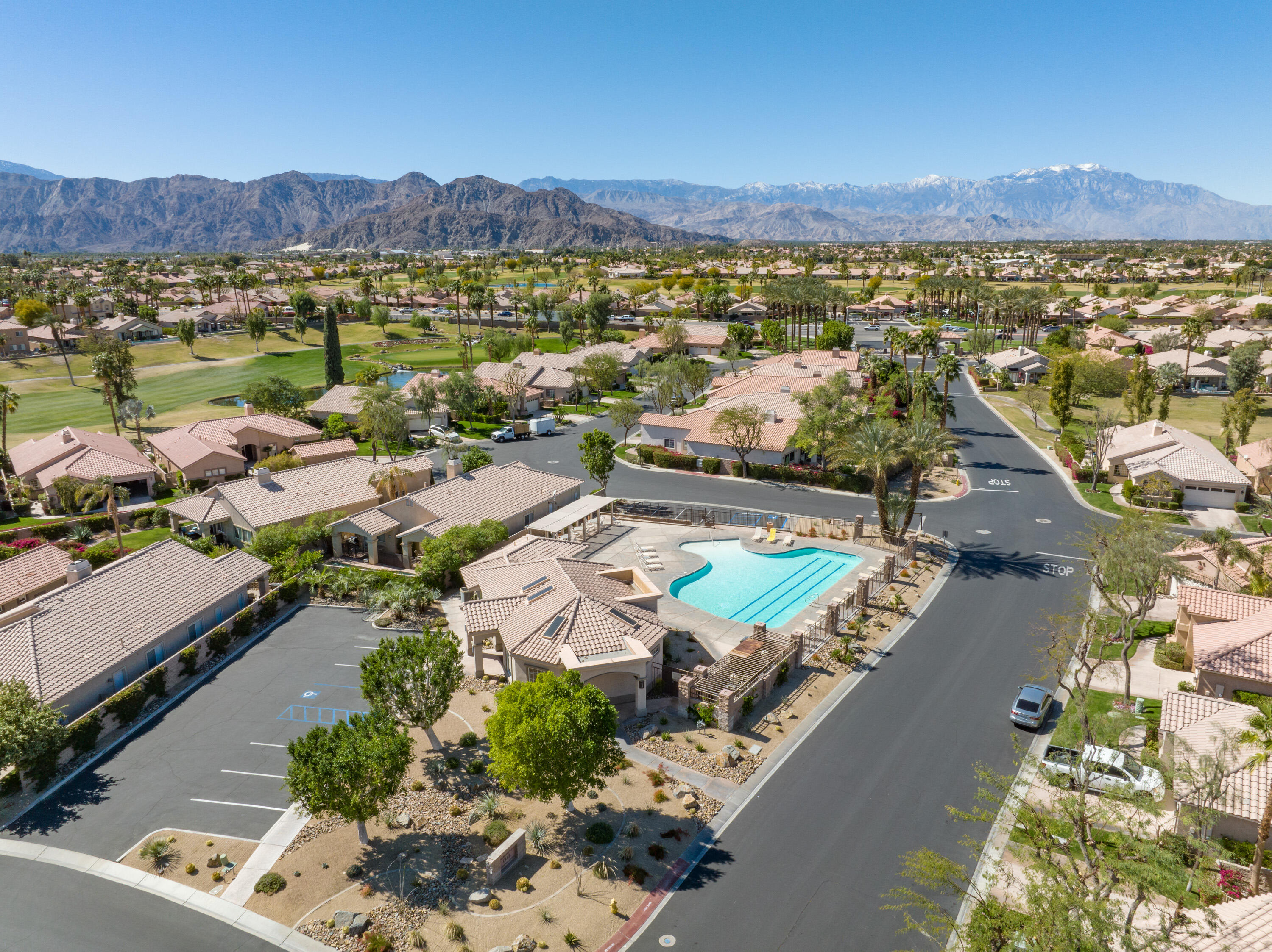 80162 Pebble Beach Drive Indio, CA 92201 - Photo 37 of 48 an aerial view of residential building and lake view