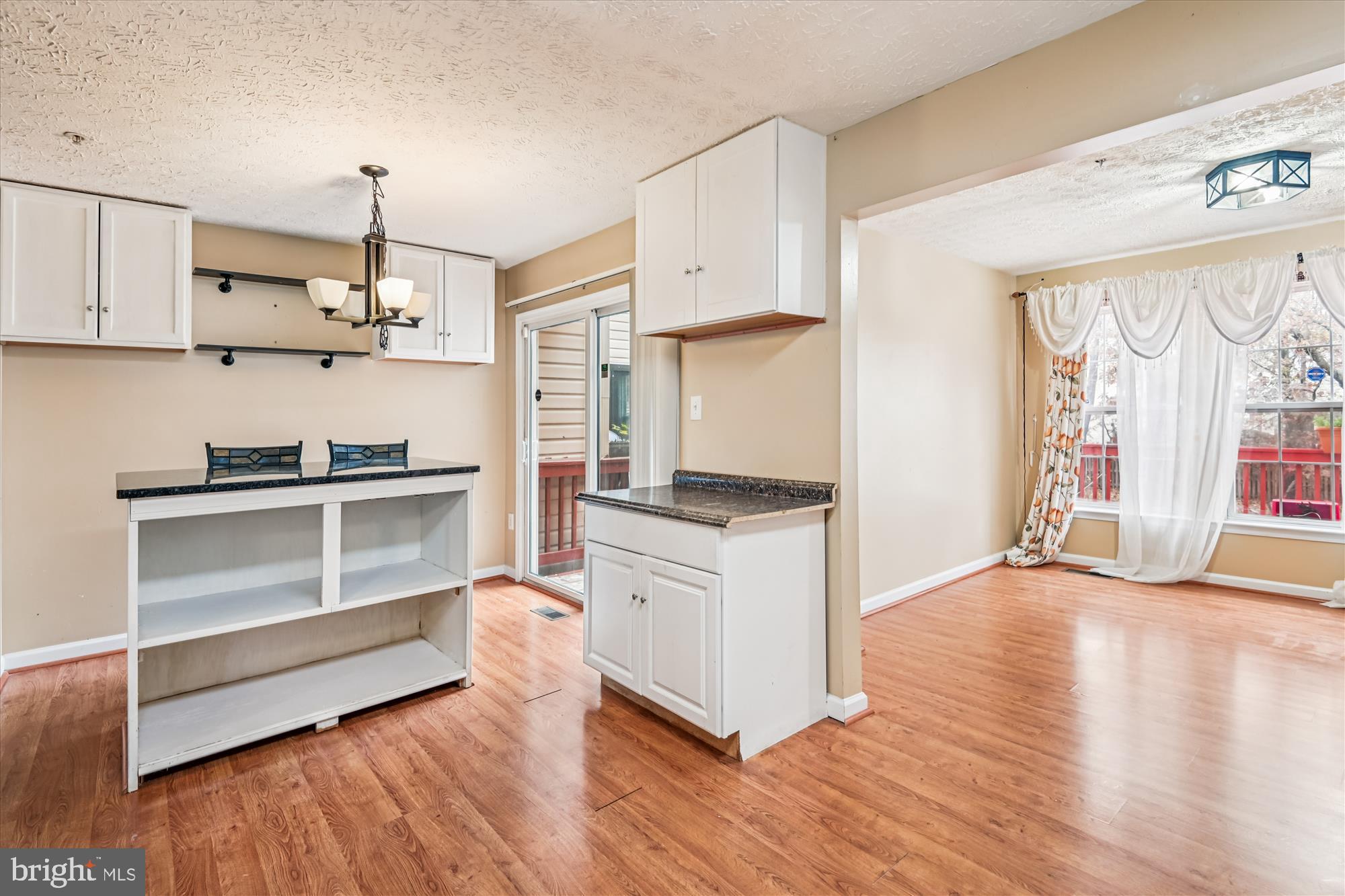 8018 Brookmead Court Severn, MD 21144 - Photo 11 of 35 a kitchen with stainless steel appliances a stove top oven and cabinets