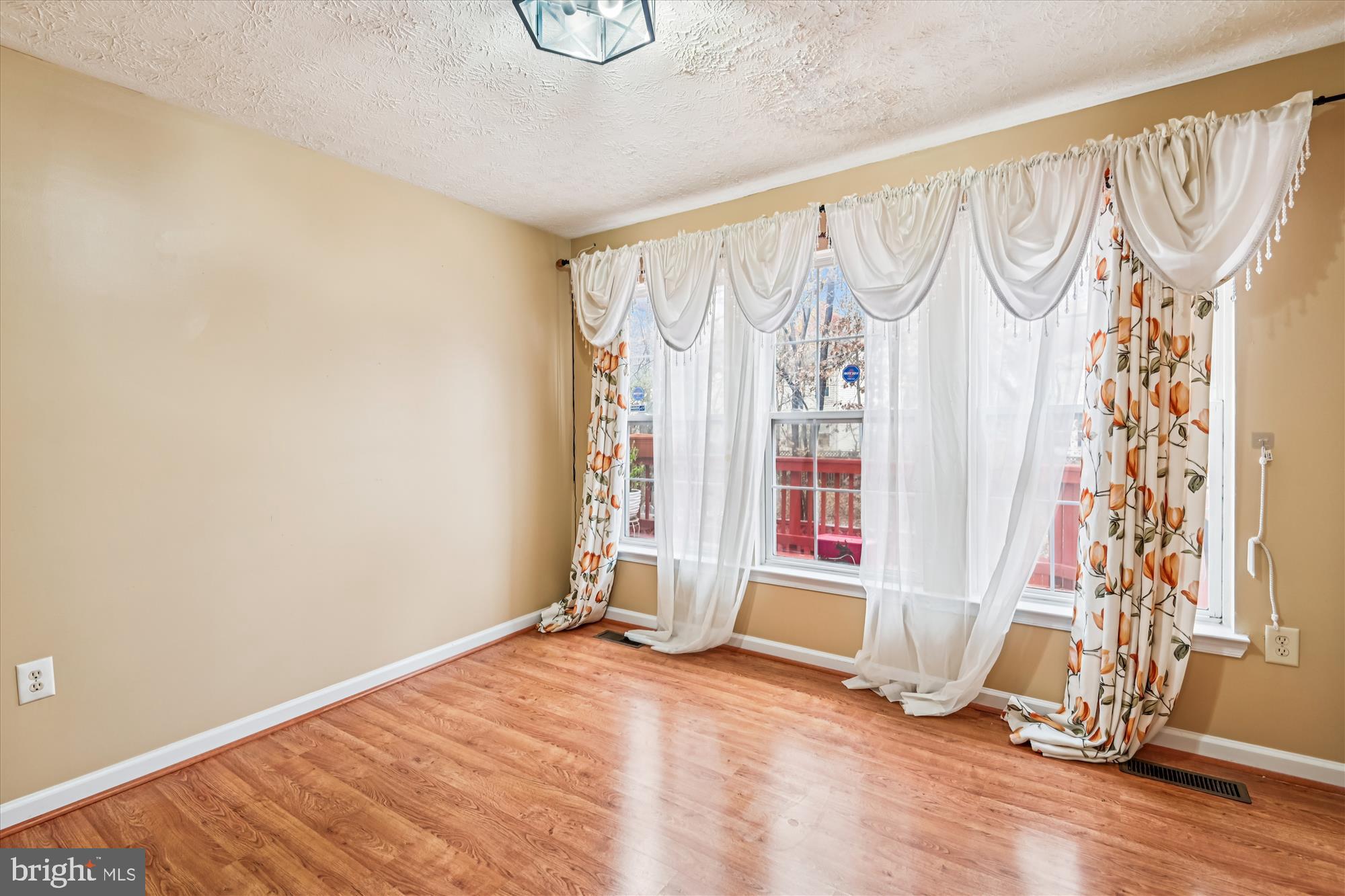 8018 Brookmead Court Severn, MD 21144 - Photo 15 of 35 a view of an empty room with a window