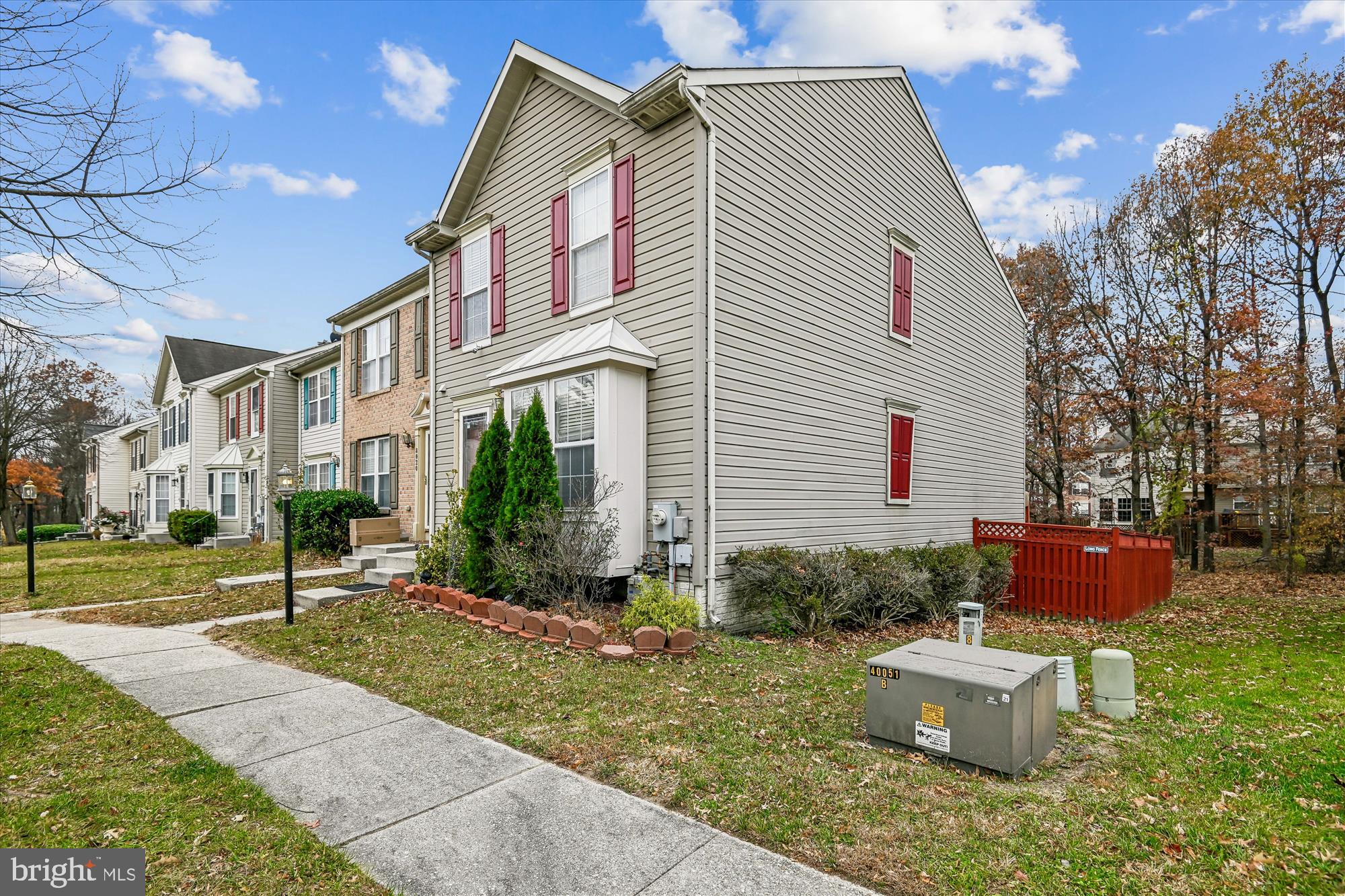 8018 Brookmead Court Severn, MD 21144 - Photo 2 of 35 a front view of a house with garden