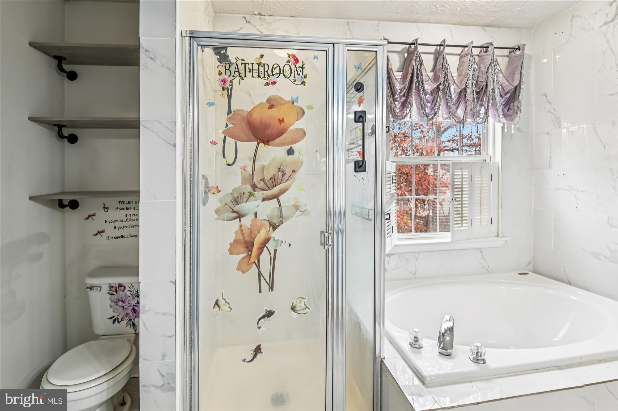 8018 Brookmead Court Severn, MD 21144 - Photo 23 of 35 a bathroom with a bathtub and shower