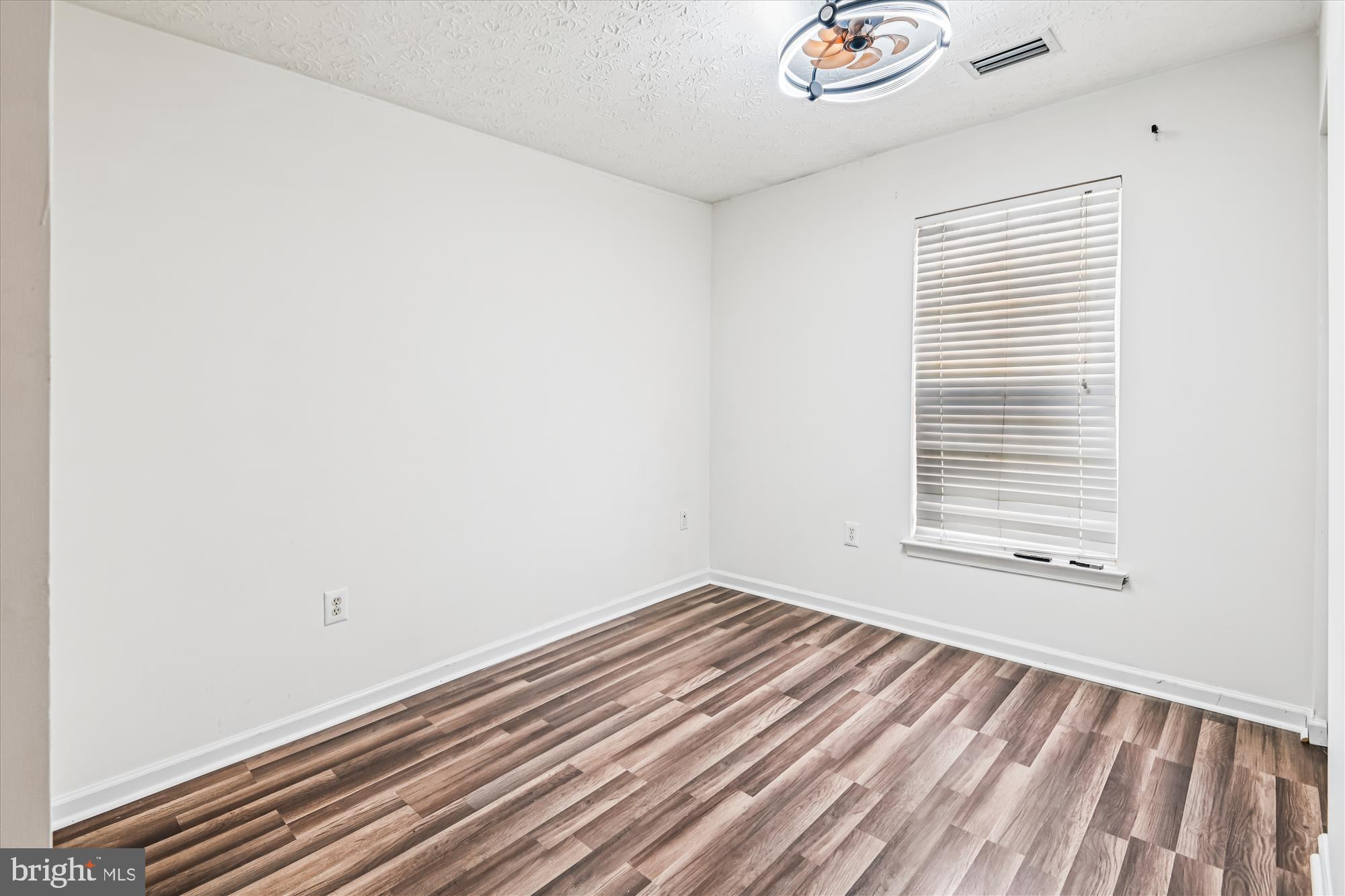 8018 Brookmead Court Severn, MD 21144 - Photo 25 of 35 a view of a room that has a window in it