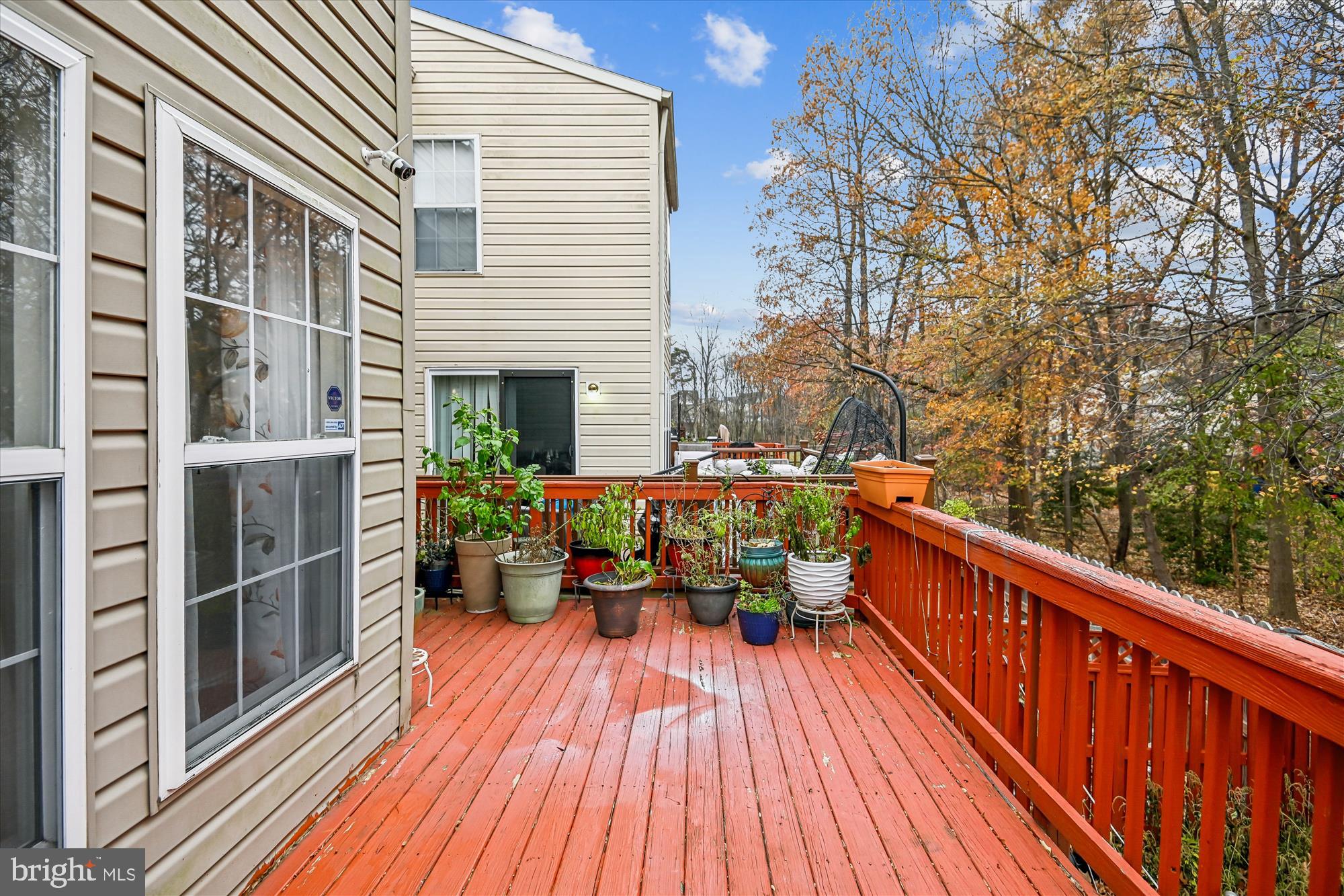 8018 Brookmead Court Severn, MD 21144 - Photo 31 of 35 a view of balcony with furniture and wooden floor