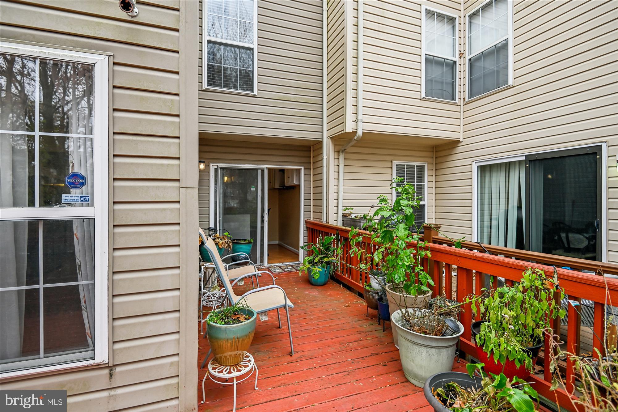 8018 Brookmead Court Severn, MD 21144 - Photo 32 of 35 a front view of a house with a potted plant