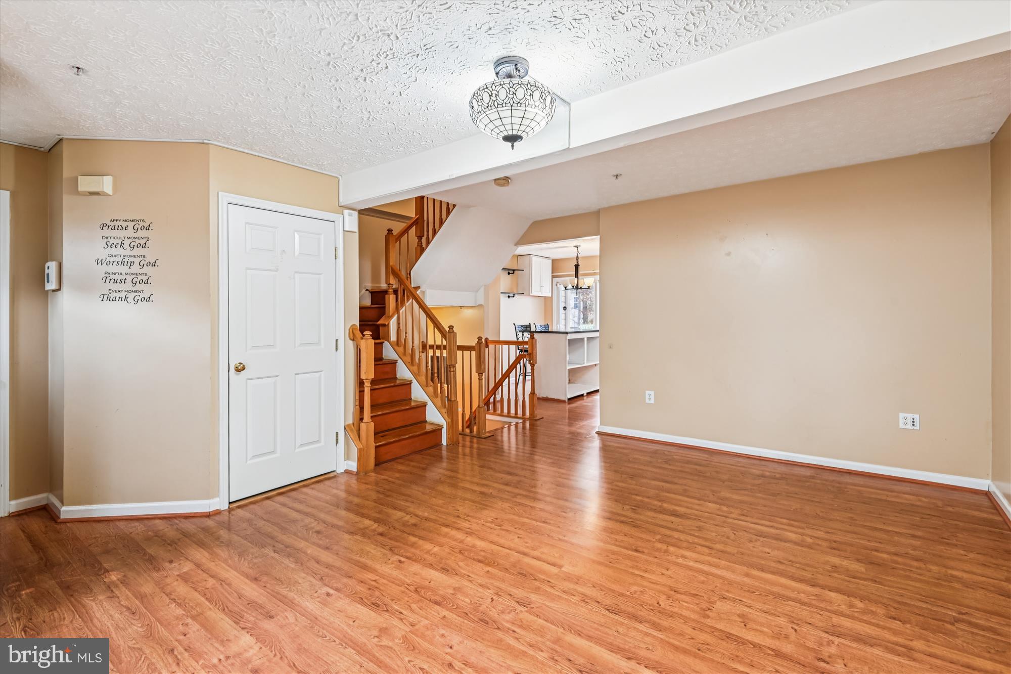 8018 Brookmead Court Severn, MD 21144 - Photo 5 of 35 a view of an empty room with wooden floor