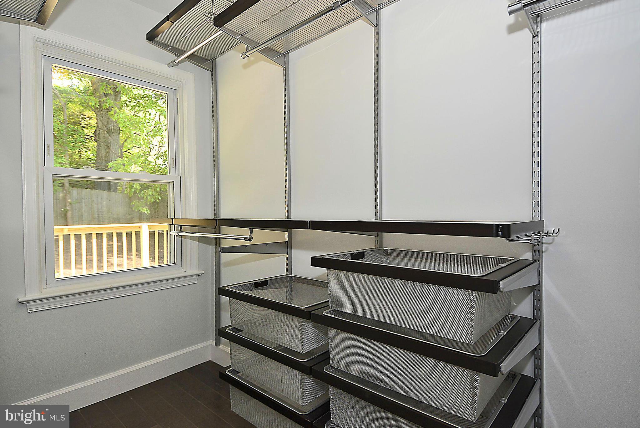 409 Branch Drive Silver Spring, MD 20901 - Photo 12 of 30 a bathroom with a sink and a window