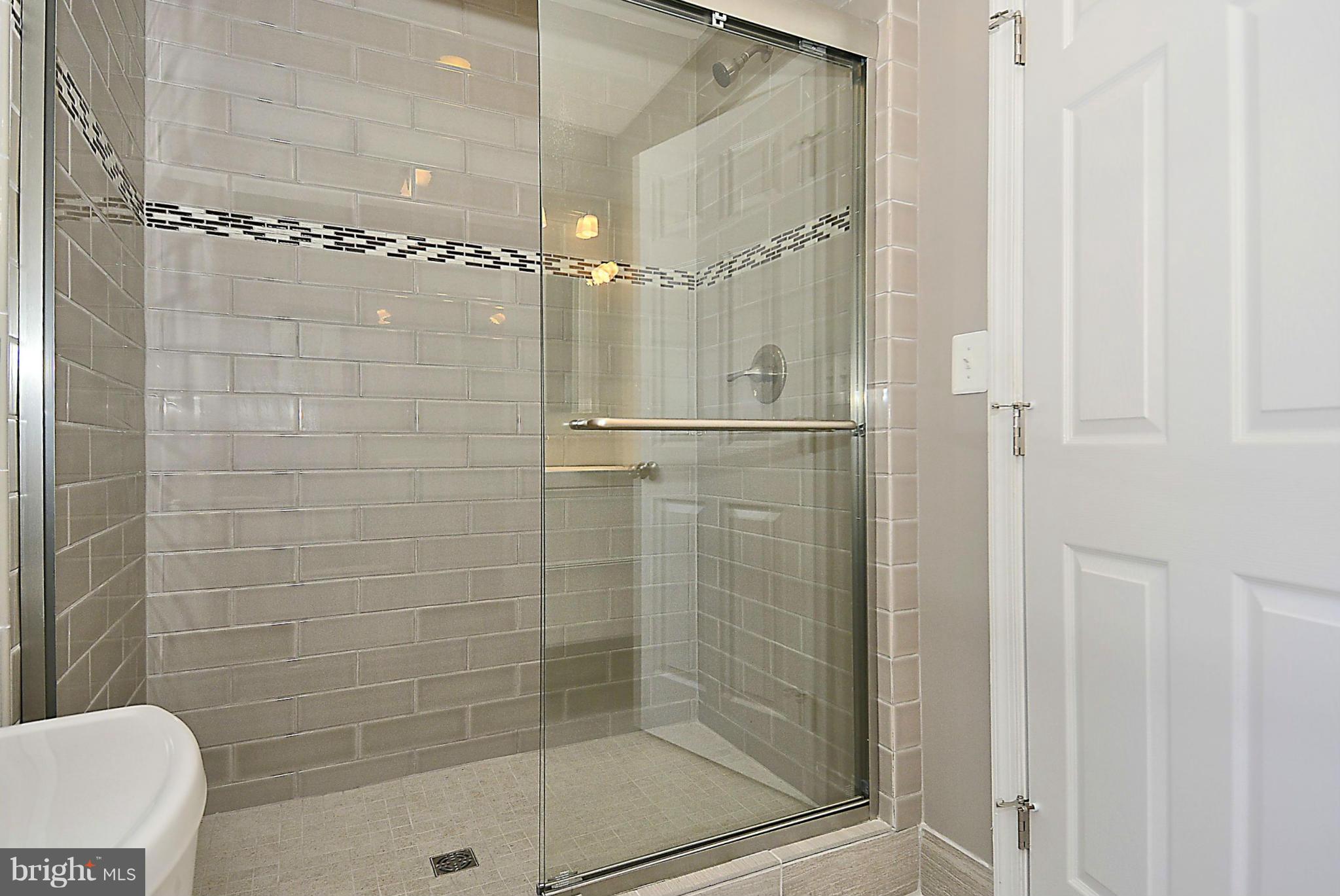 409 Branch Drive Silver Spring, MD 20901 - Photo 14 of 30 a bathroom with a shower