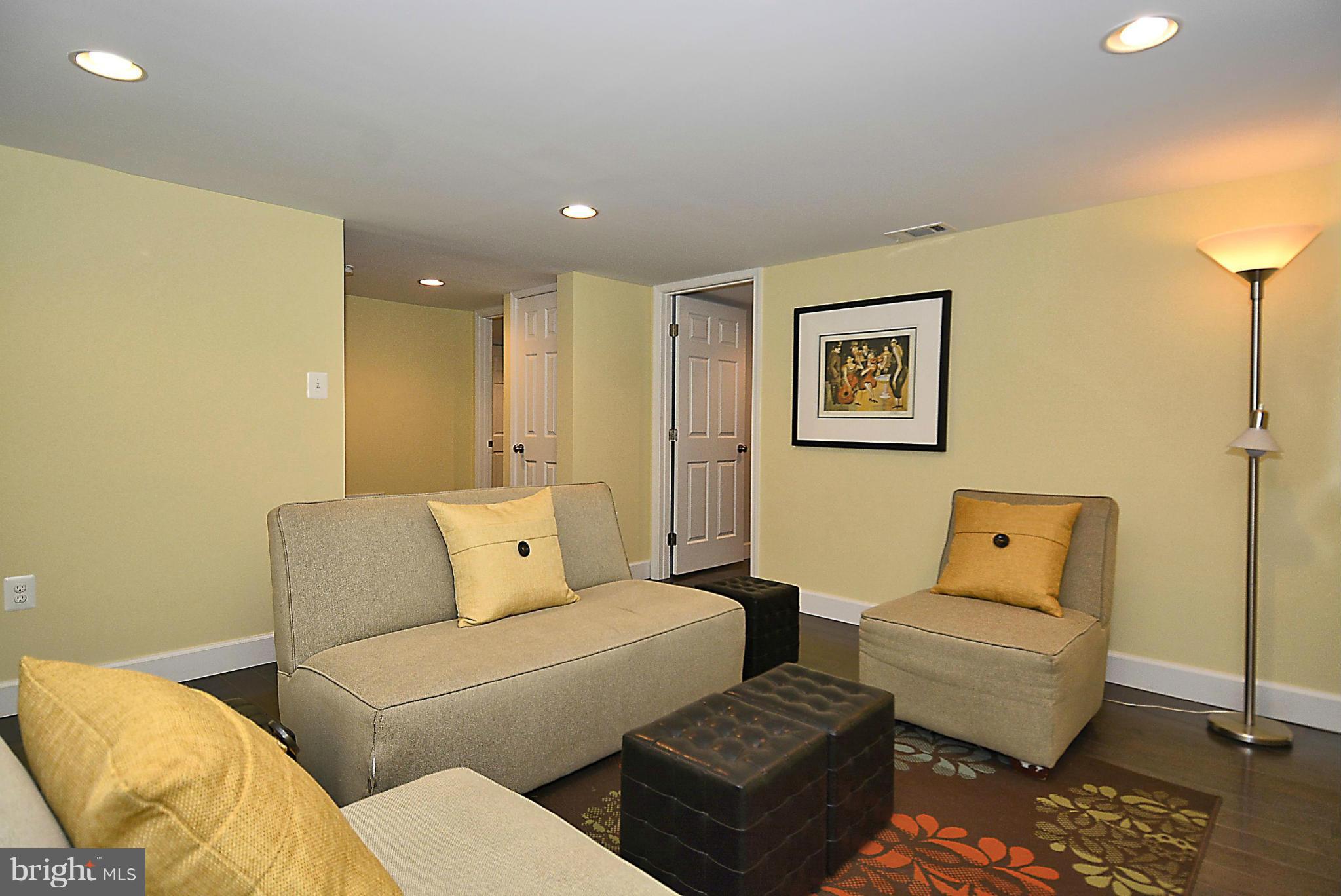 409 Branch Drive Silver Spring, MD 20901 - Photo 19 of 30 a bedroom with furniture and a couch